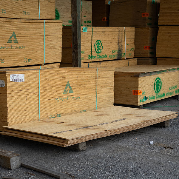 stacks of sheet wood on a pallet